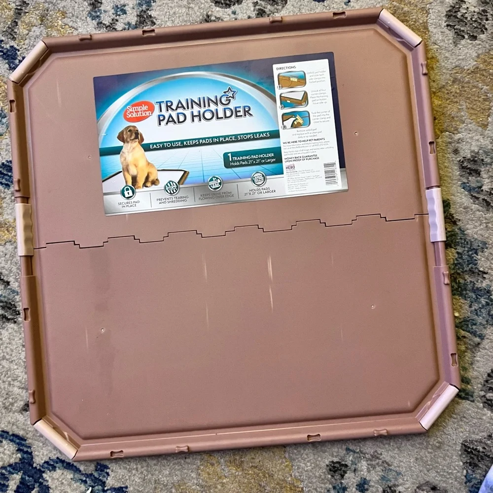 Training pad holder